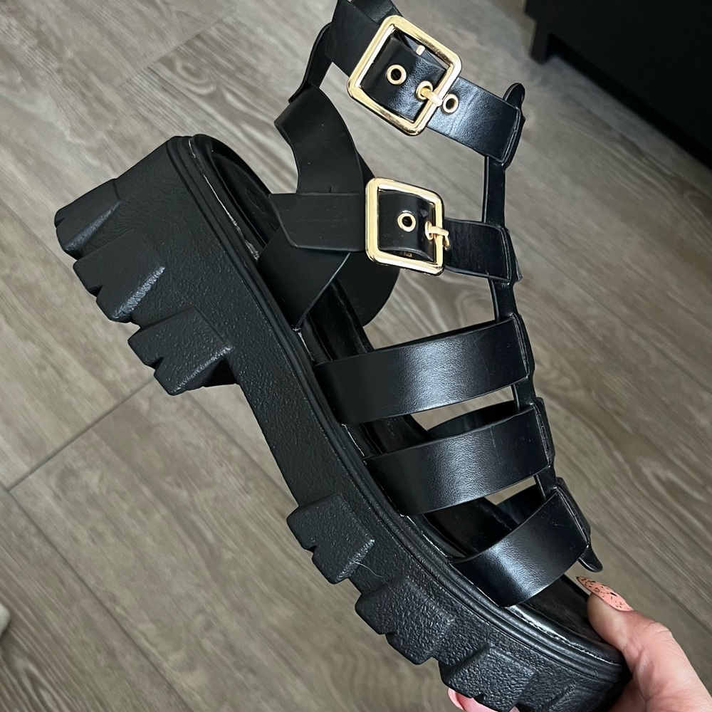 Selling a pair of chunky platform buckled fisherman sandals